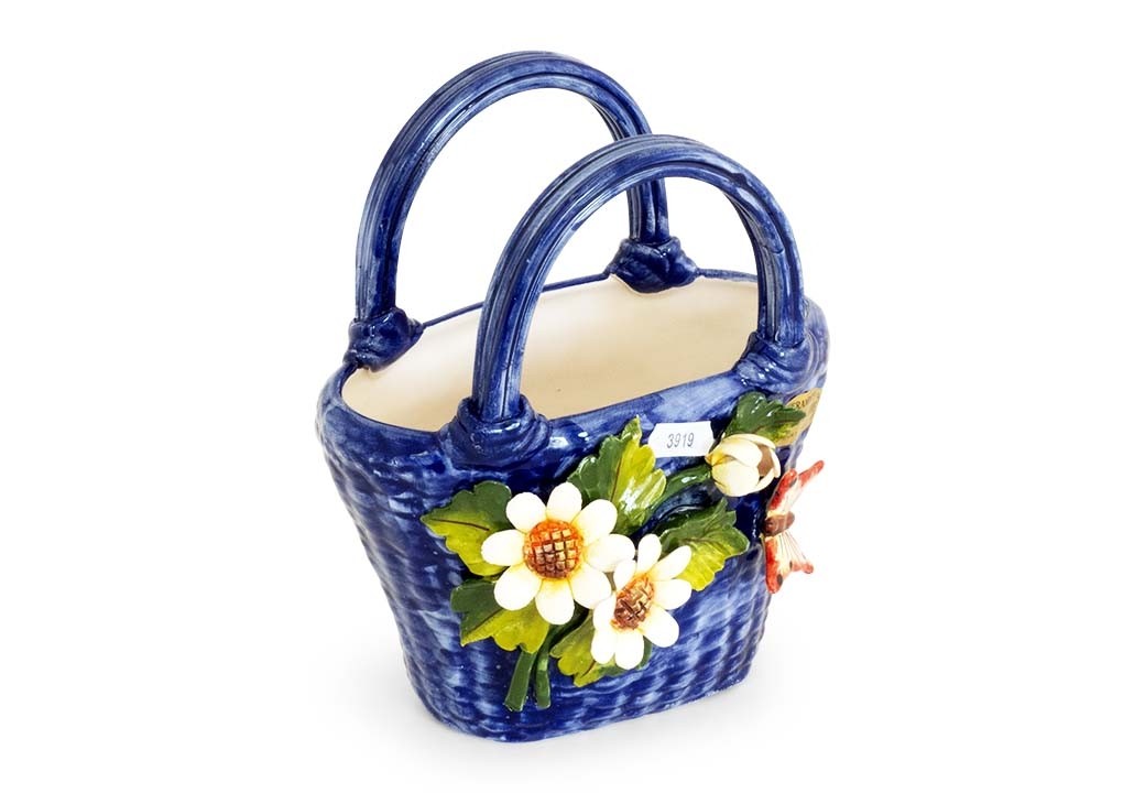 Bolsa pequena azul com flores