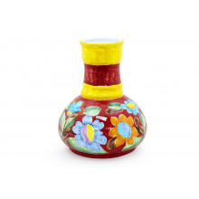 Vaso genie com flores vermelho